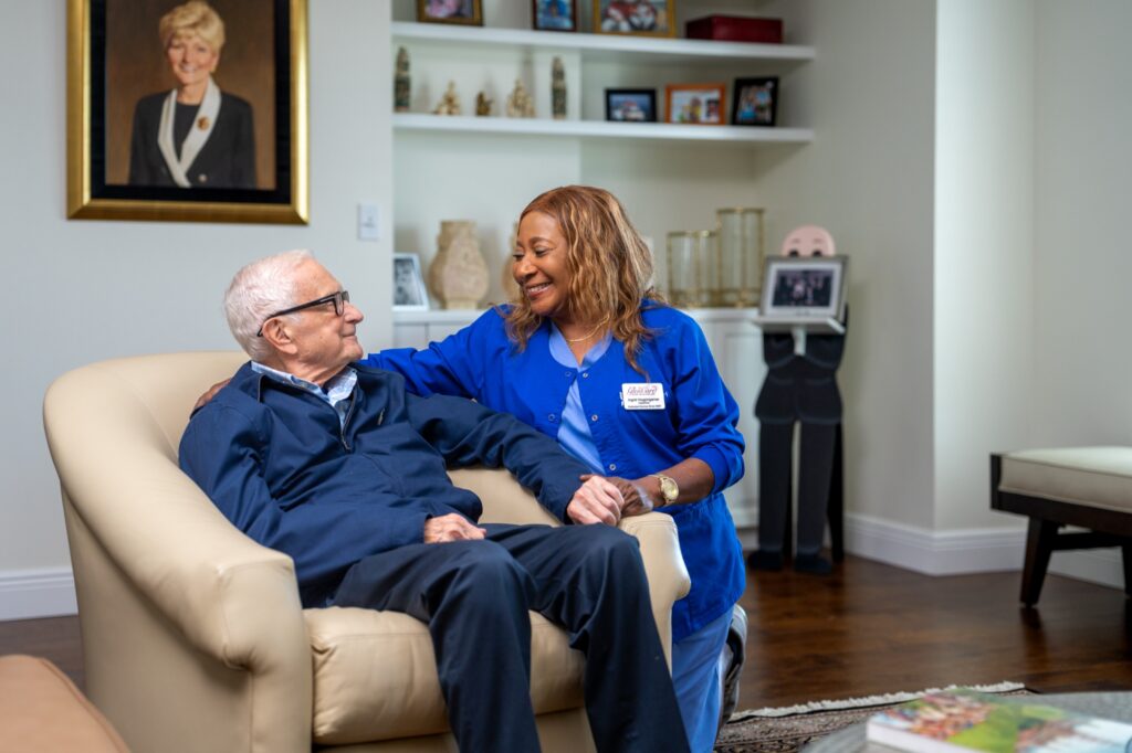 Residents socializing at a group activity at The Glenview