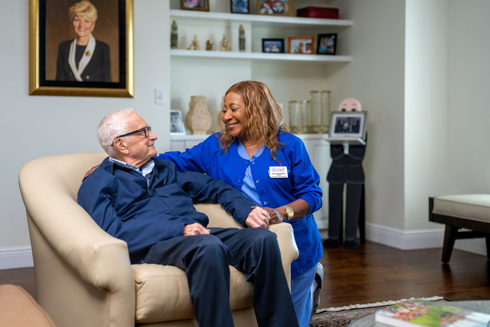 Residents socializing at a group activity at The Glenview